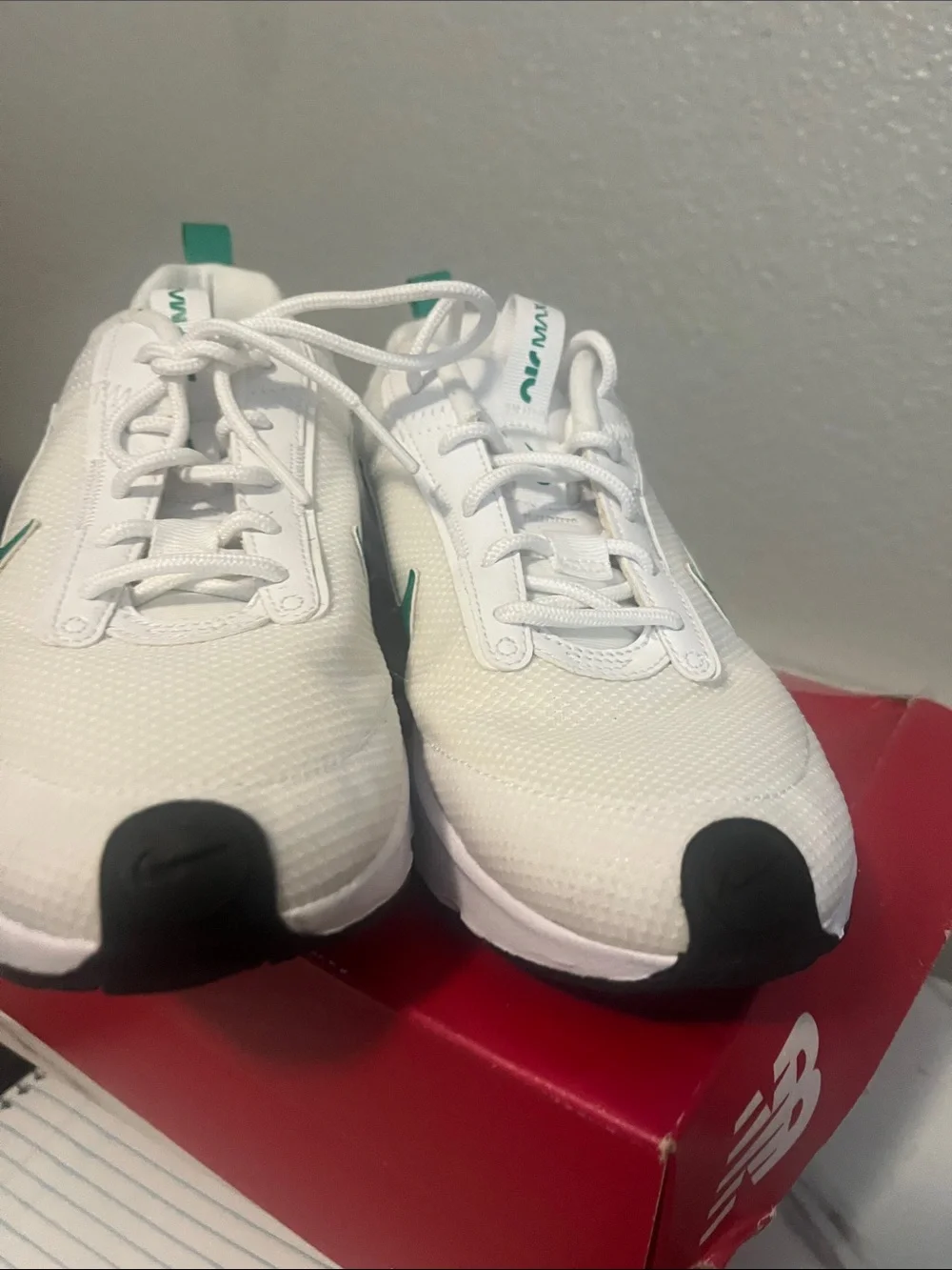 Ladies Nike White Running Shoes with Teal Swoosh